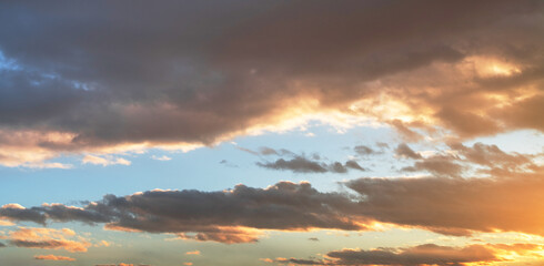 Wall Mural - sunset sky background. beautiful bright sunset sky with clouds.