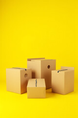Aufkleber - Ecommerce business concepts feature a group of products in boxes on a bright yellow colored background for online ordering._00002_