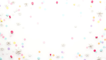 Aufkleber - Colorful confetti blends with delicate snowflakes on a crisp white background, creating a festive and wintry flat lay scene._00003_