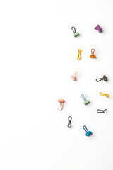 Aufkleber - A set of colorful paper clips arranged on a white background to convey business creativity and flat lay design concepts._00001_