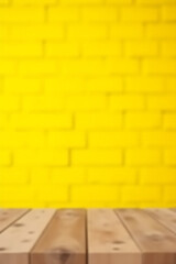 Aufkleber - A selective focus on an empty wooden table top against a bright yellow brick wall background is created visually._00002_