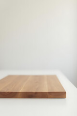 Aufkleber - A real wooden tabletop sits on a crisp white surface in a minimalist home office setting background._00002_