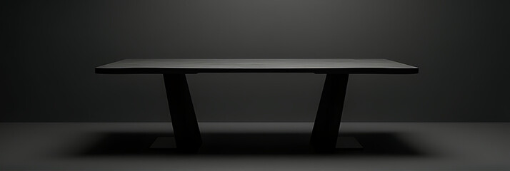Poster - A modern worktable with a sleek black finish sits against a simple yet elegant dark colored background design._00001_