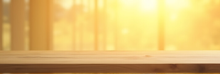 Poster - A minimalist wooden table is set against a warm, blurred light gold background in an artistic abstract composition._00001_