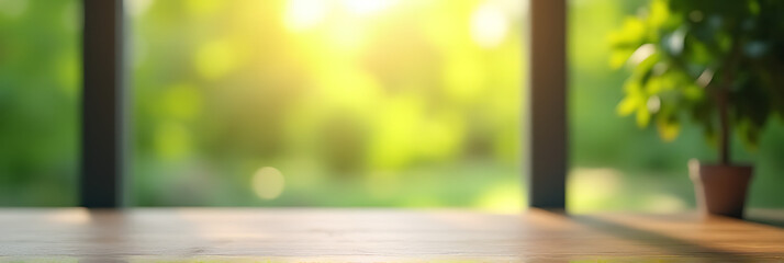 Aufkleber - A blurred image of a green garden is visible through the window on an empty wooden table in the morning light._00001_