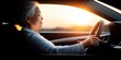 © Ms_Tali - Elderly woman driving at sunset: serenity and independence on the open road