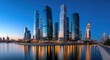 © lililia - Long exposure reveals dynamic light streaks and the glow of skyscrapers in Moscow City, creating a futuristic urban panorama at night.