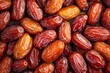 © Downloads - Closeup of fresh organic date fruits arranged together in studio setting for commercial photography