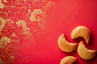 © Duckai - Copy Space Chinese Fortune Cookies with Traditional Asian Symbols on Red Background for Lunar New Year 2025 Wooden Snake
