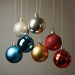 © MdArif - Christmas ornaments, colorful baubles, red and blue spheres, glittery decorations.