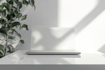 Poster - sleek laptop resting on clean white desk with subtle reflections