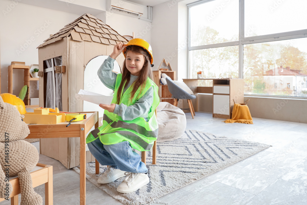 Cute little builder at home