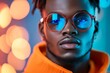 © Odin AI - Bright blue sunglasses enhance the striking features of a young man in an urban setting at night