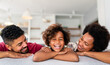 © NDABCREATIVITY - Portrait of smiling young african american family with small teenage daughter. Happy family