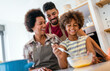 © NDABCREATIVITY - Overjoyed young african american family with kid have fun cooking at home together,