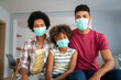 © NDABCREATIVITY - Family is wearing facemasks during coronavirus and flu outbreak. Virus and illness protection, COVID