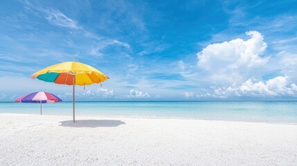 Canvas Print - Colorful beach umbrellas on a sunny beach.