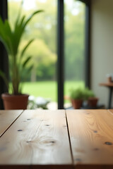 Poster - Wooden table top surface blends into a soft blur with the garden in view outside through the adjacent window._00002_