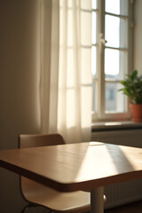 Poster - A blurred curtain hangs behind a wooden table, with natural light streaming through an adjacent window in the morning._00002_