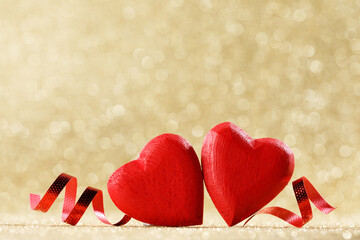 Wall Mural - wooden hearts on bokeh background