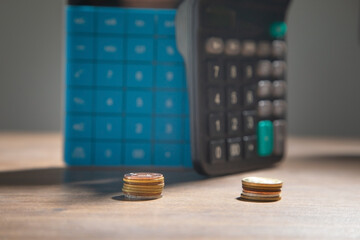 Wall Mural - Coins with calculator. Business. Finance