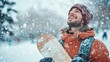 © Napasnan - A cheerful male student holding a snowboard, looking up at the winter sky with excitement, ready for adventure on snowy slopes