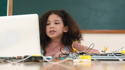 Poster - attractive african student programing system while looking at camera. american girl working on her l