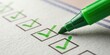 © InspireStock Gallery - A close-up of a green marker filling in a checklist box with a green check mark on a white sheet of paper