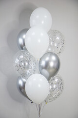 Wall Mural - bouquet of white and silver balloons for a holiday, birthday card with balloons