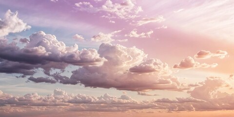 Poster - A Dramatic Sky with Clouds of Various Shapes and Sizes Painted in Soft Hues of Pink and Orange