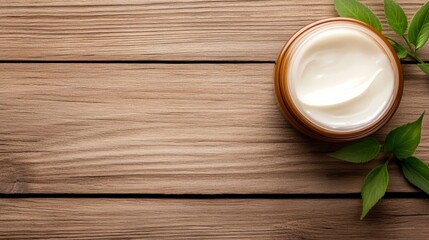  Natural Skincare Cream on Wooden Background - Luxurious natural cream, wooden texture, fresh leaves, skincare, beauty.  Organic ingredients for healthy skin.
