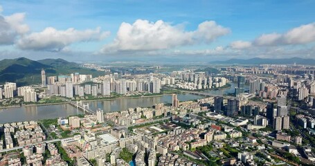 Wall Mural - Aerial shot of modern city buildings and river in Zhuhai, China