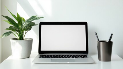 Aufkleber - Front view of a laptop with a white screen on a table, accompanied by an office cup and a green plant in a pot, set in a minimalist interior with white background and soft lighting, mockup, template