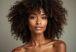 © Vibudhaart - A beautiful young woman with a stunning afro and flawless skin, radiating confidence and natural beauty.