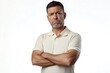 © Harsha - Middle aged man in polo shirt with skeptical expression.