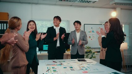 Poster - Business team celebrating successful project completion with enthusiastic clapping, showing strong teamwork and professional achievement in modern corporate workspace