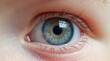 © Olga Ко - Detailed Close-Up of a Baby's Eye and Pupil - Front View