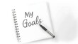 © Igoudesign - A notebook with the words My Goals written on a blank page, accompanied by a pen, symbolizes the intention to set and achieve personal aspirations through organized planning