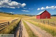© Nana - A scenic rural landscape featuring a red barn along a gravel path under a blue sky.