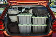 © Austockphoto - Extremely full hatchback car for a weekend camping trip