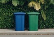 © warunthorn - Colorful Recycling Bins Surrounded by Lush Green Foliage