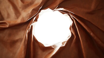 Poster - Brown leather crumples around a bright white hole, with the light piercing through the material and creating a surreal effect.
