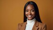 © buddhika - young black woman with dark straight long hair and a confident smile wearing a white turtleneck top and a brown blazer on a brown background