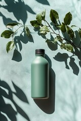 Poster - clean flat lay of eco-friendly reusable bottle placed on smooth matte surface under soft natural light