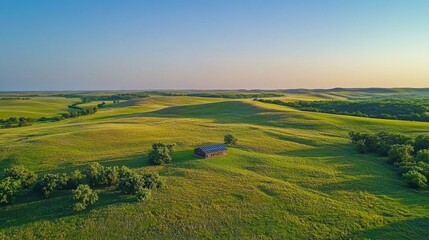 Poster - A large field with a small house in the middle