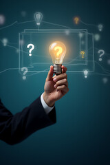 Poster - Businessmen hold light bulbs to represent ideas and solutions to problems while using a virtual screen with a question mark icon._00002_