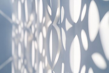 Poster - Light and shadow pattern on a white surface with geometric cutout design.