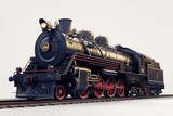 Vintage steam locomotive model displaying intricate details and craftsmanship in a studio setting
