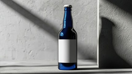 Poster - Blue glass bottle with blank white label on a minimalist background showcasing shadows, ideal for beverage, product placement, or branding mockups in creative projects