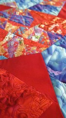 Aufkleber - Colorful Quilt With Intricate Patterns Showcasing Vibrant Red, Blue, and Gold Fabrics in Close-Up